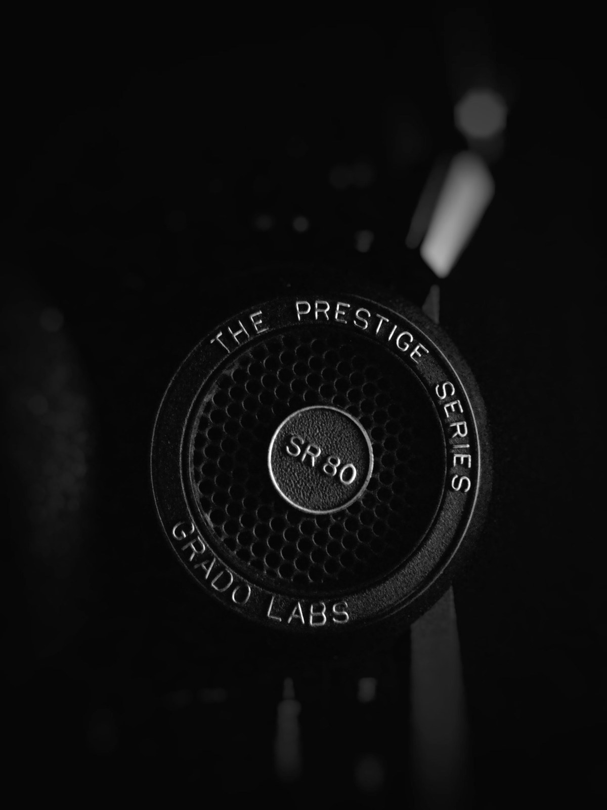 A black-and-white close-up of headphones